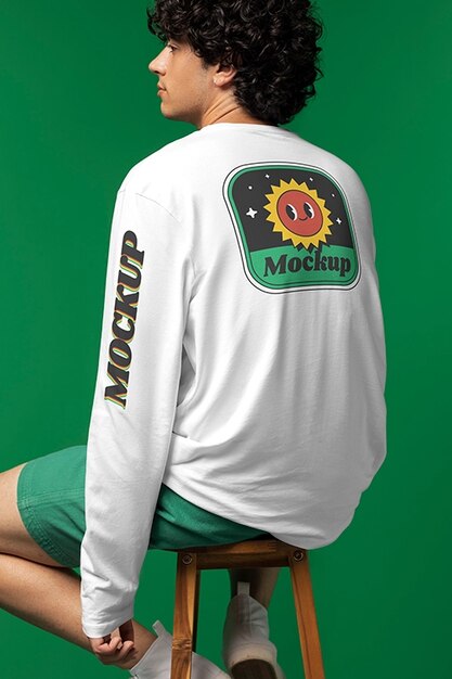 Side view man sitting on chair