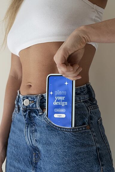 Woman hand holding smartphone mock-up indoors